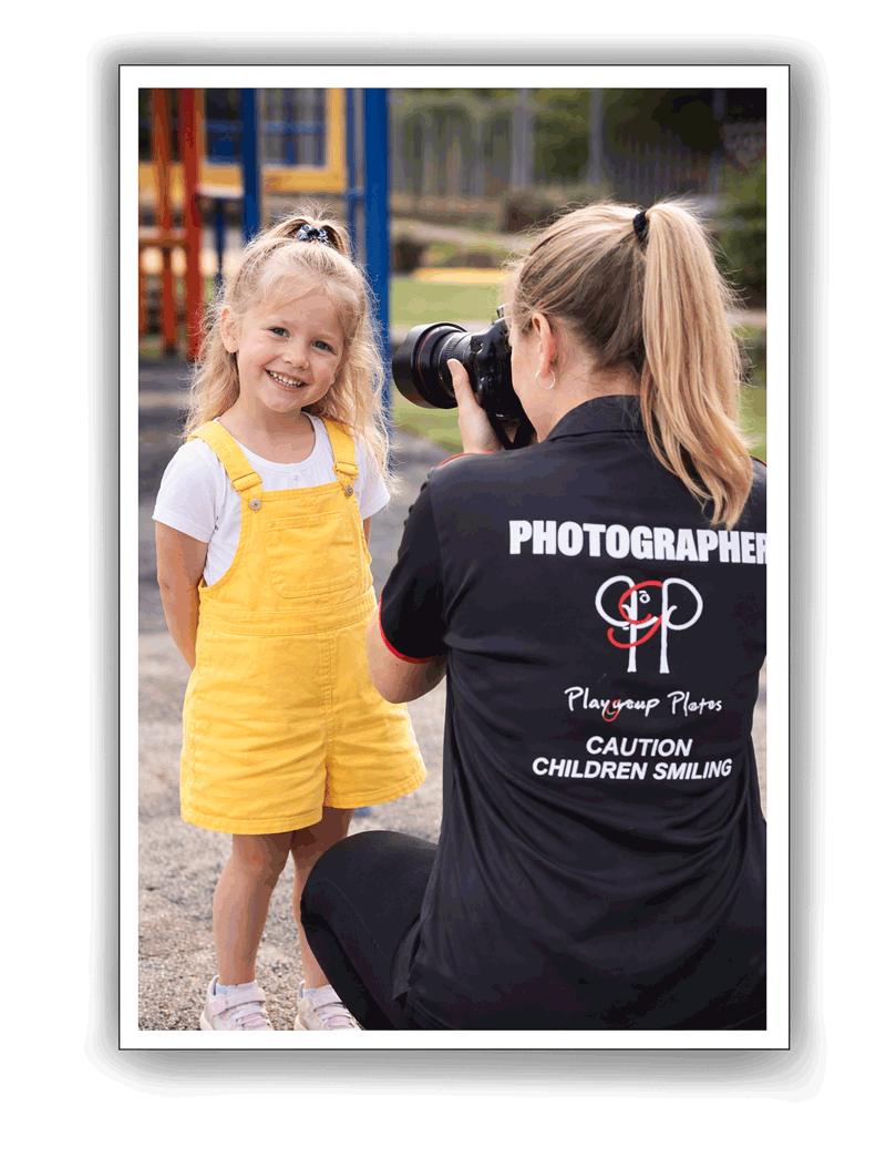 Young girl in yellow smiling for her photo