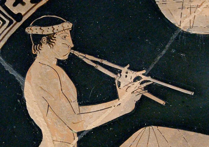 Músico tocando el aulós. 460 a. C. Museo del Louvre