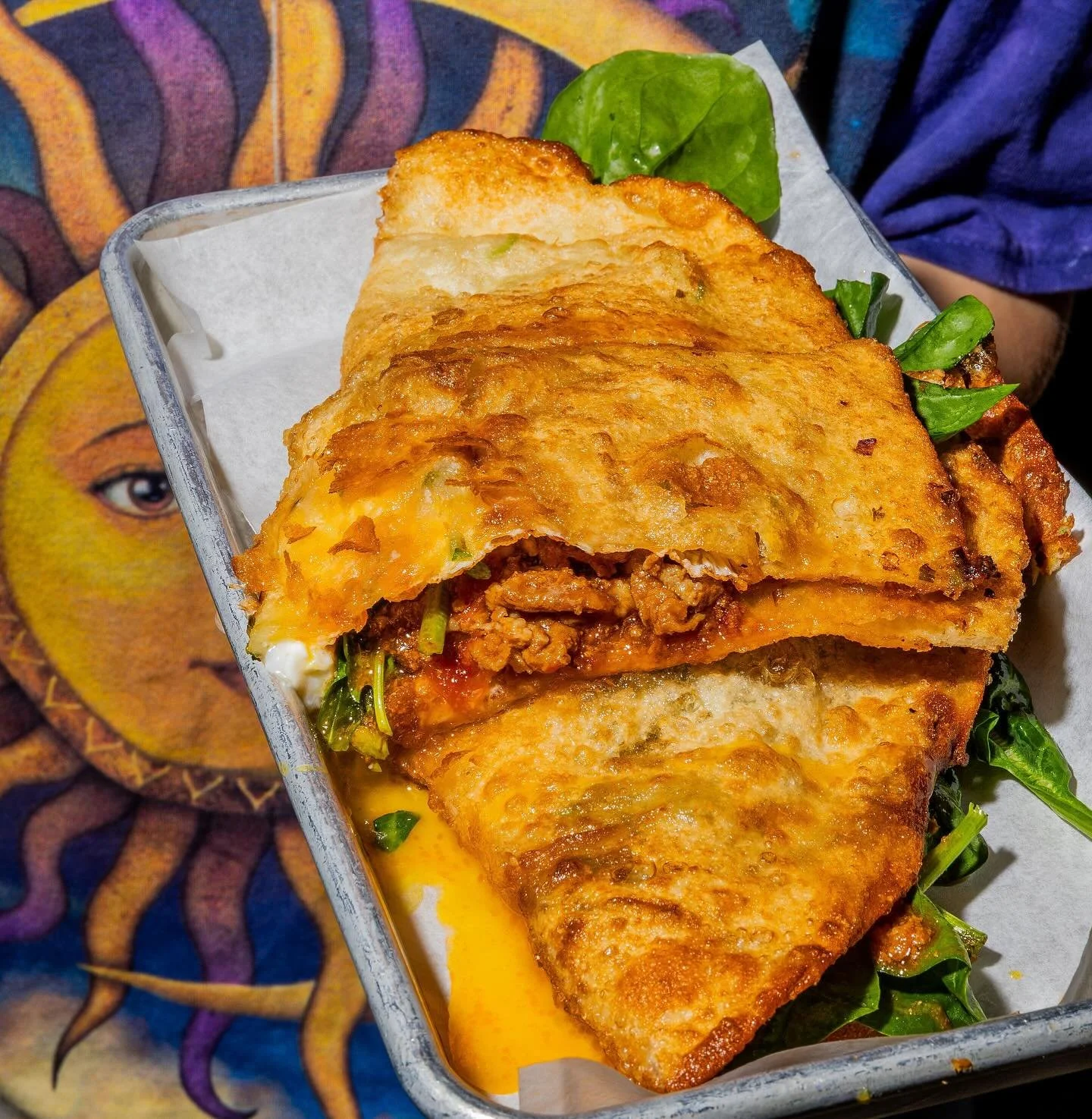 Our Sloppy Explosion Egg Pancake is our fun little breakfast twist on a Taiwanese classic: Scallion Pancake. We stuff it with caramelized tomato pork sauce, egg, spinach, and a drizzle of our specialty garlic oyster sauce. Crispy, saucy, and just the