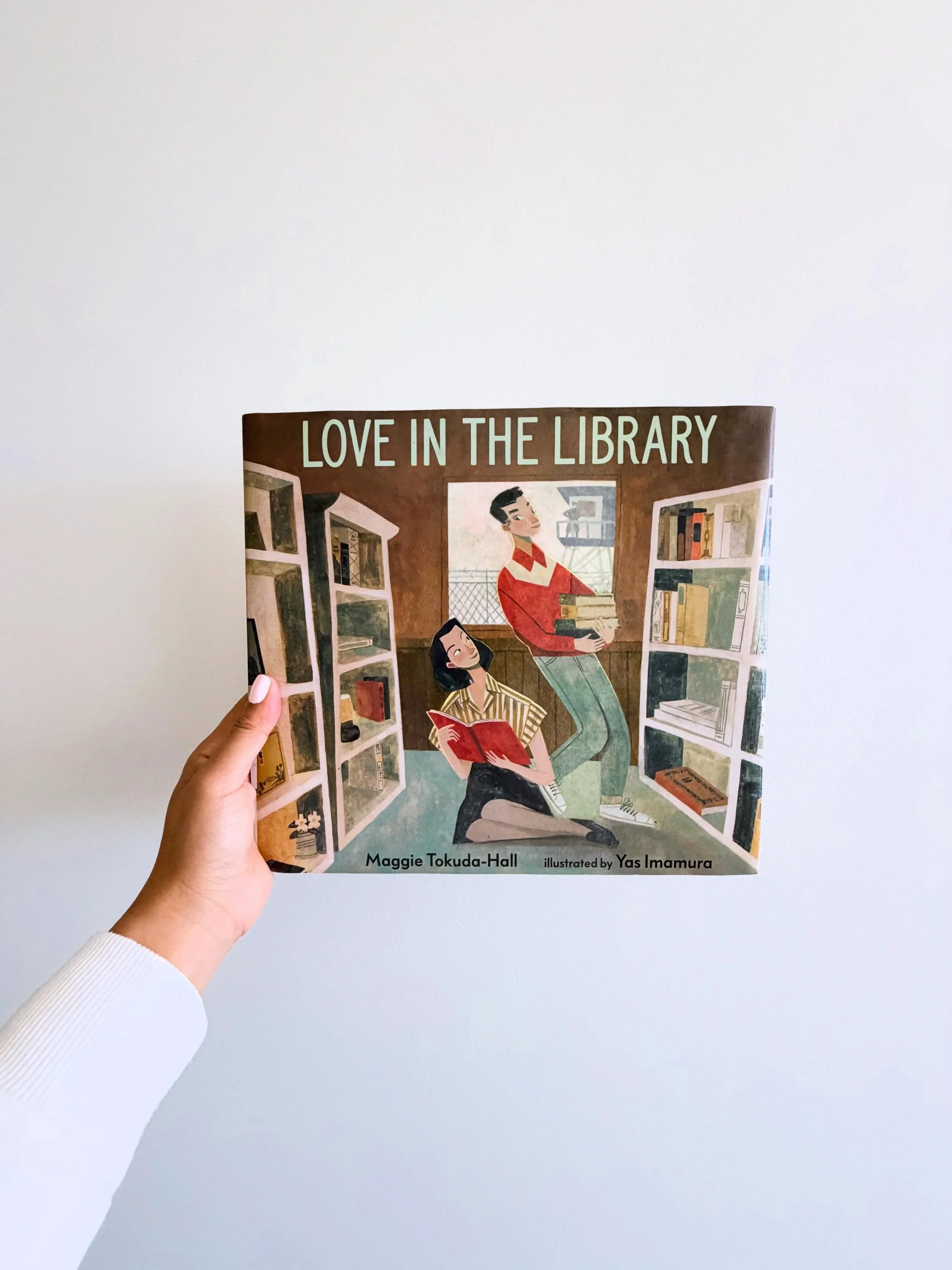 Tama works in the small library at Minidoka, a prison camp in the desert where Japanese Americans are being held during World War II. She escapes into books to forget the constant fear and the life she lost. Every morning, George waits by the door wi