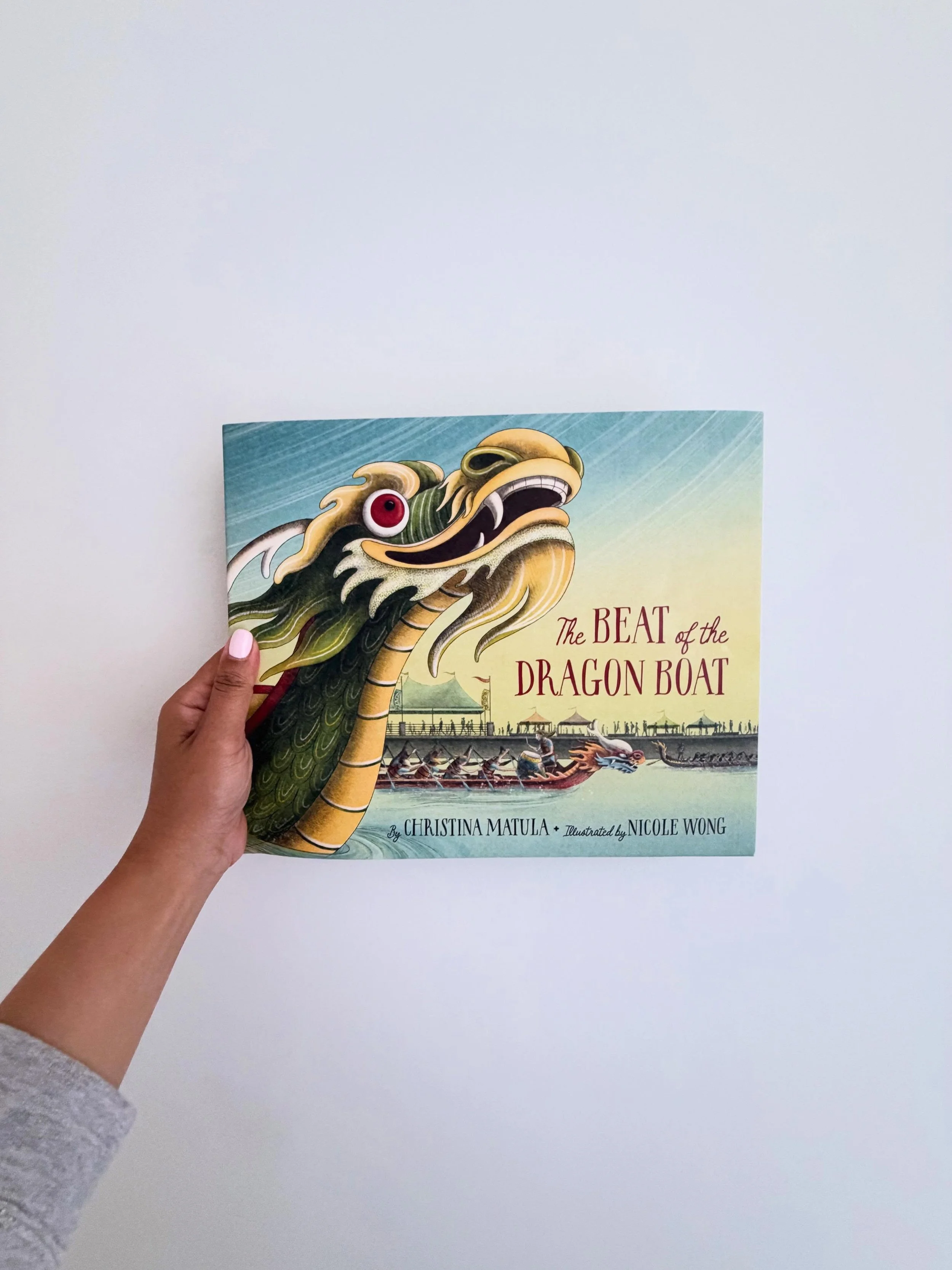 A young boy asks his grandfather how dragon boat races first began. Yeye tells him the legend of the guardian dragons who once carried the sun&rsquo;s warmth, the sea&rsquo;s breezes, and the sky&rsquo;s rain to help humankind . On race day, as a fin