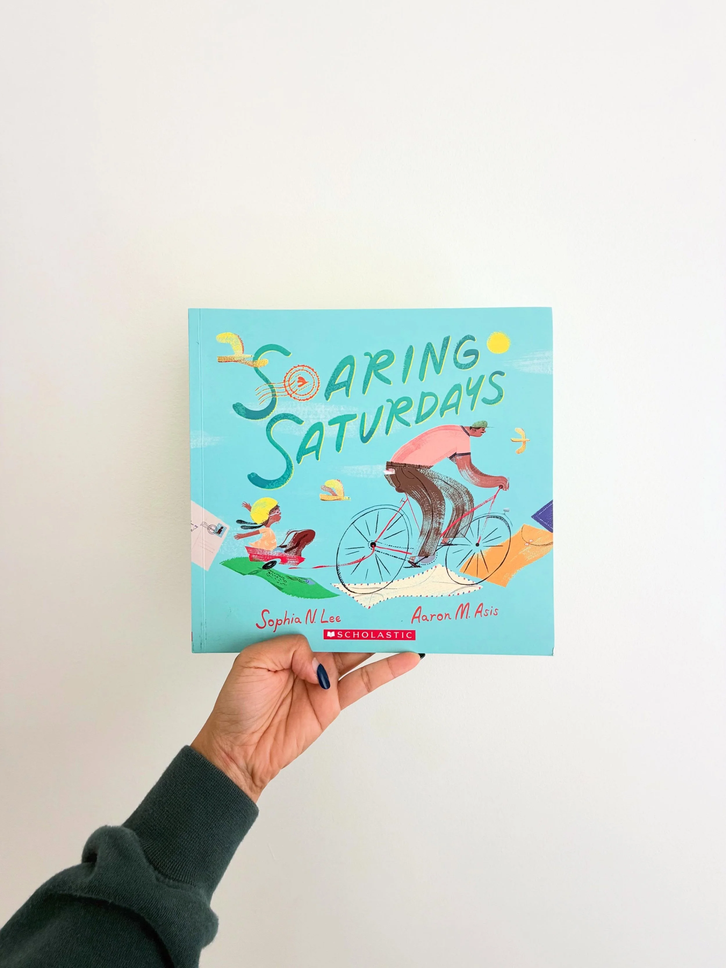 Saturdays are Sarah&rsquo;s favorite day of the week. That&rsquo;s when she helps her Papa deliver letters around Quezon City. She rides in a red wagon hitched to his bicycle, handing out envelopes and dreaming over postcards. With every picture of a