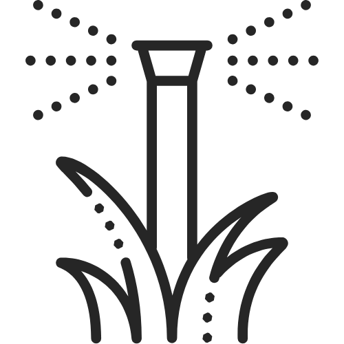 sprinkler with water in lawn