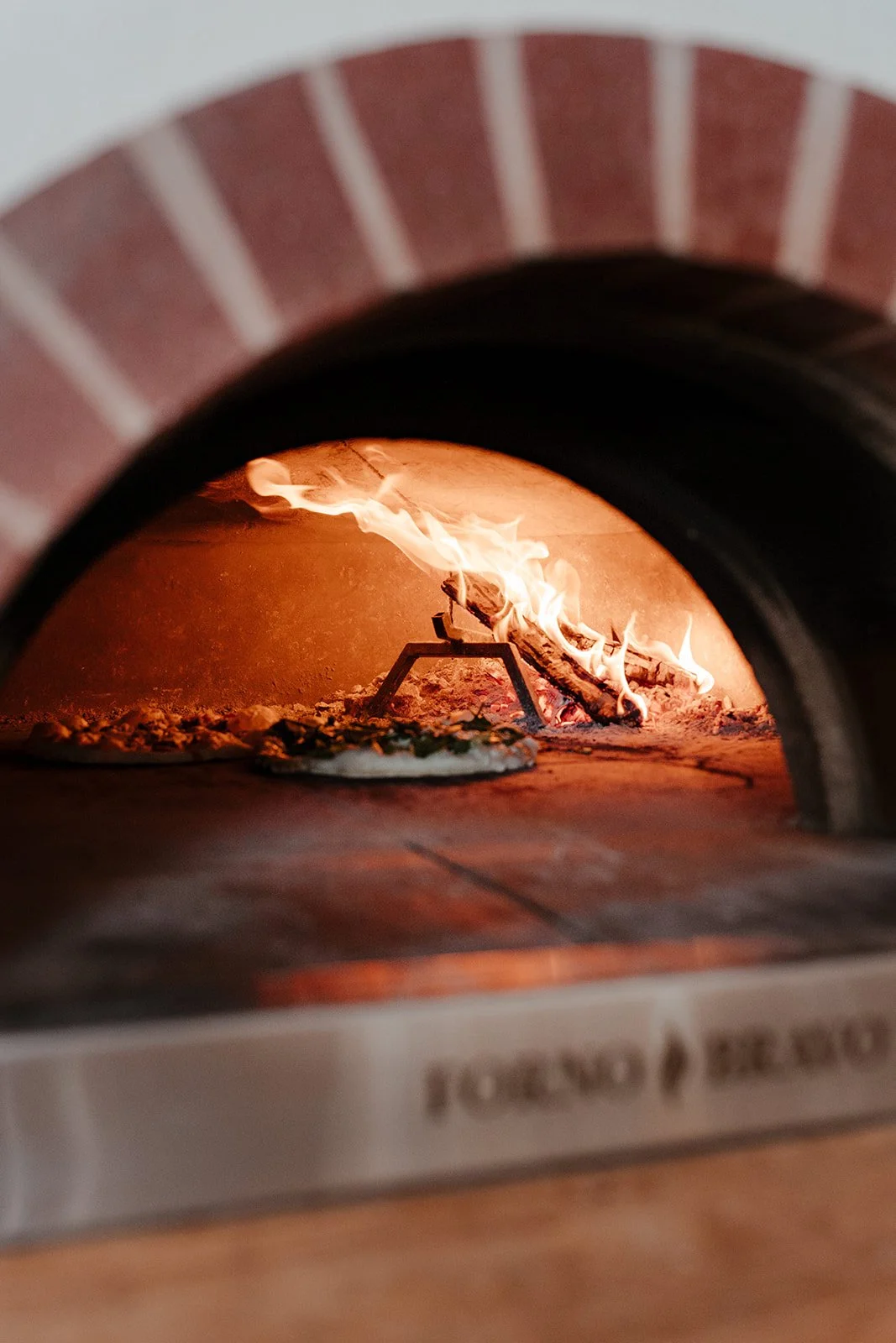 Wood Fired Pizza, Cocktails & Inspired Dishes Hearth & Table