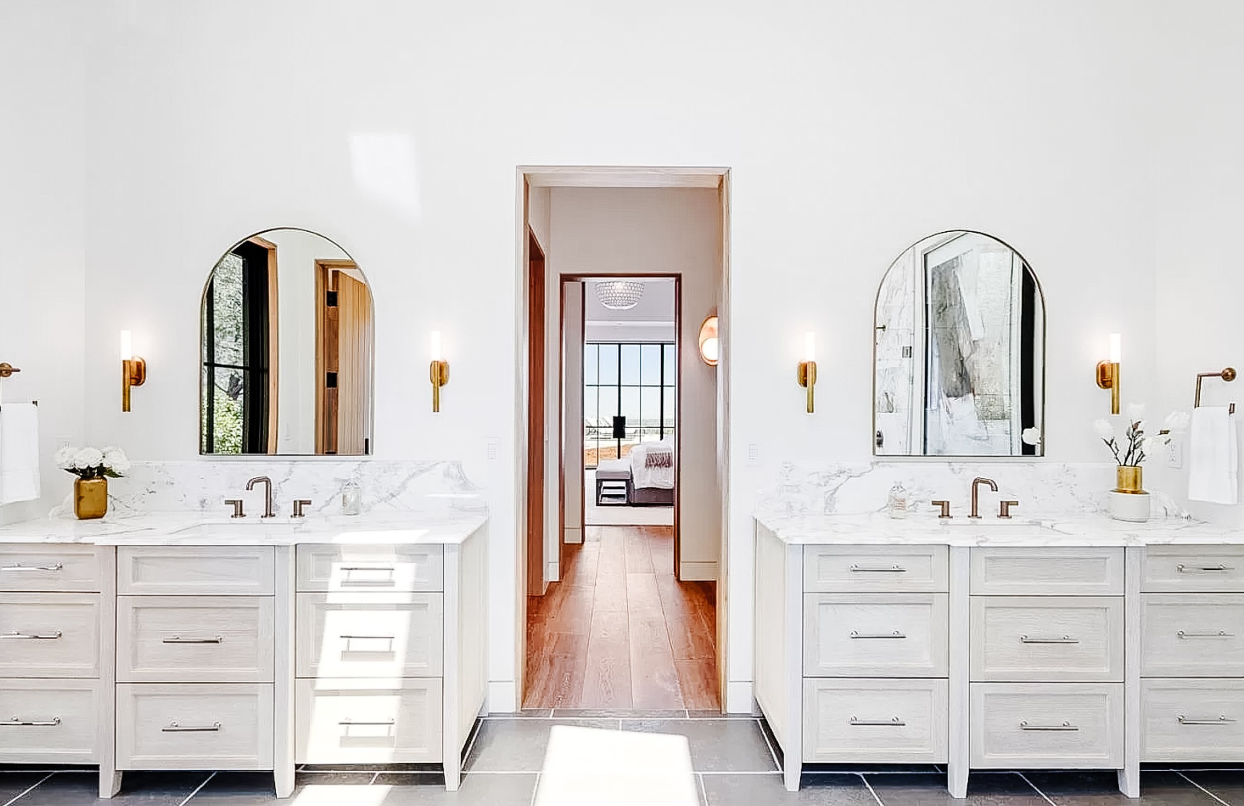 Fully customized closet room; en suite marble bath has separate vanities