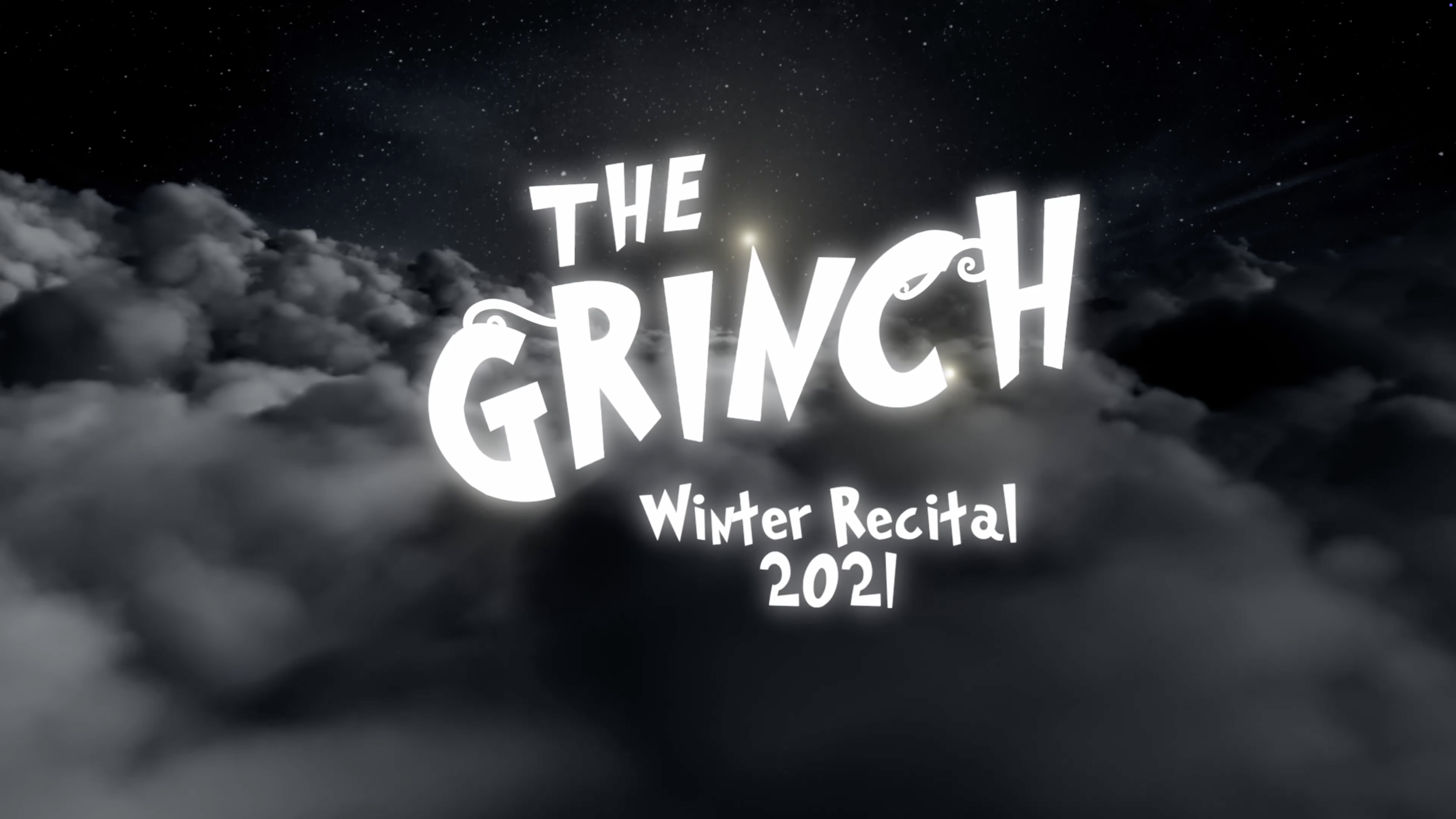 Text overlay on a cloudy sky with stars that reads 'The Ginch Winter Recital 2021'.
