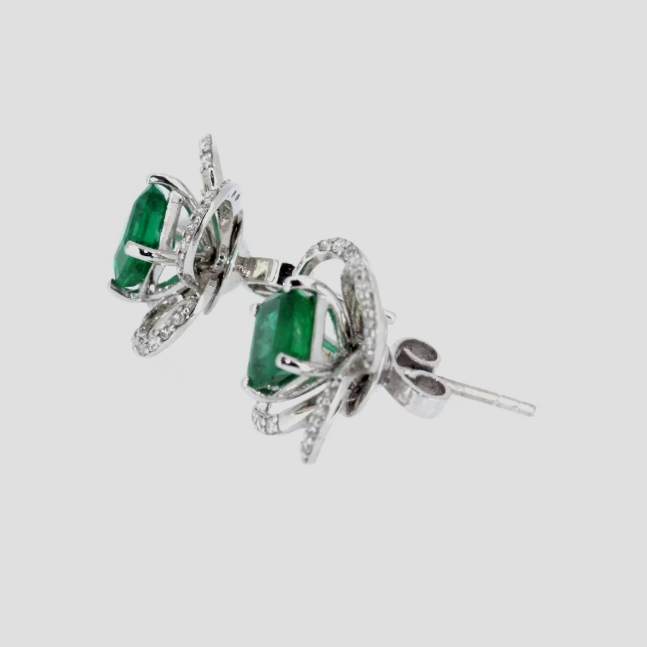 Emerald-diamond-cluster-earrings-night-day-18k-white-gold-jewellery-www.saulgreenstein.co.uk2.png