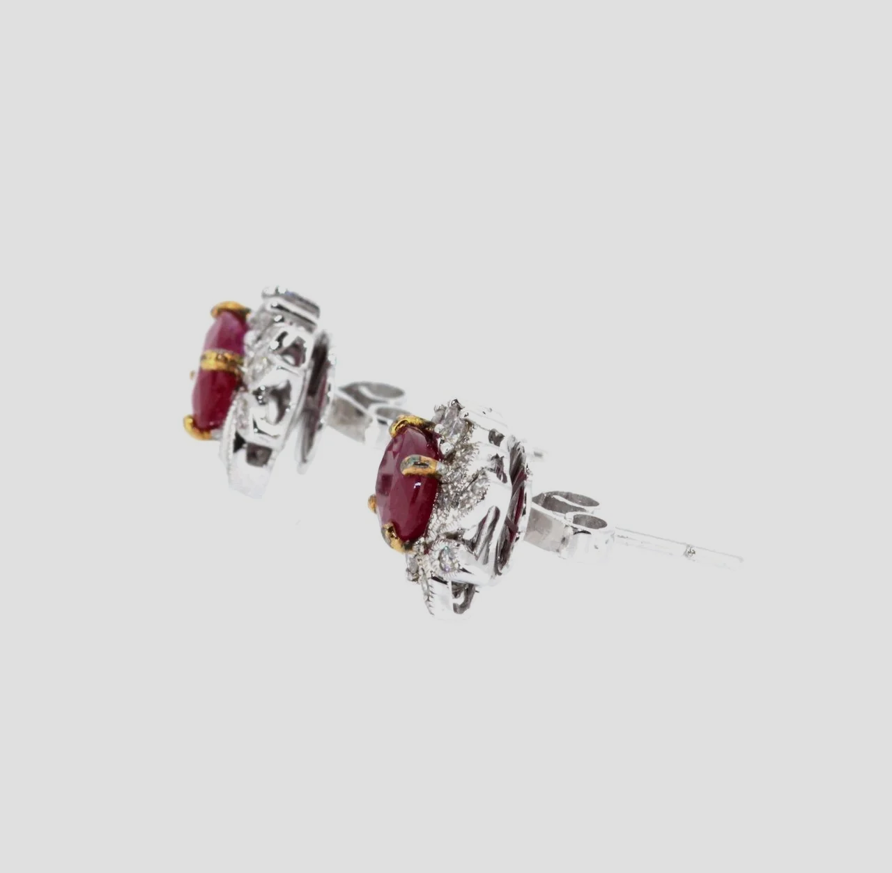 Fancy-ruby-diamond-cluster-earrings-18k-white-gold-jewellery-www.saulgreenstein.co.uk2.png