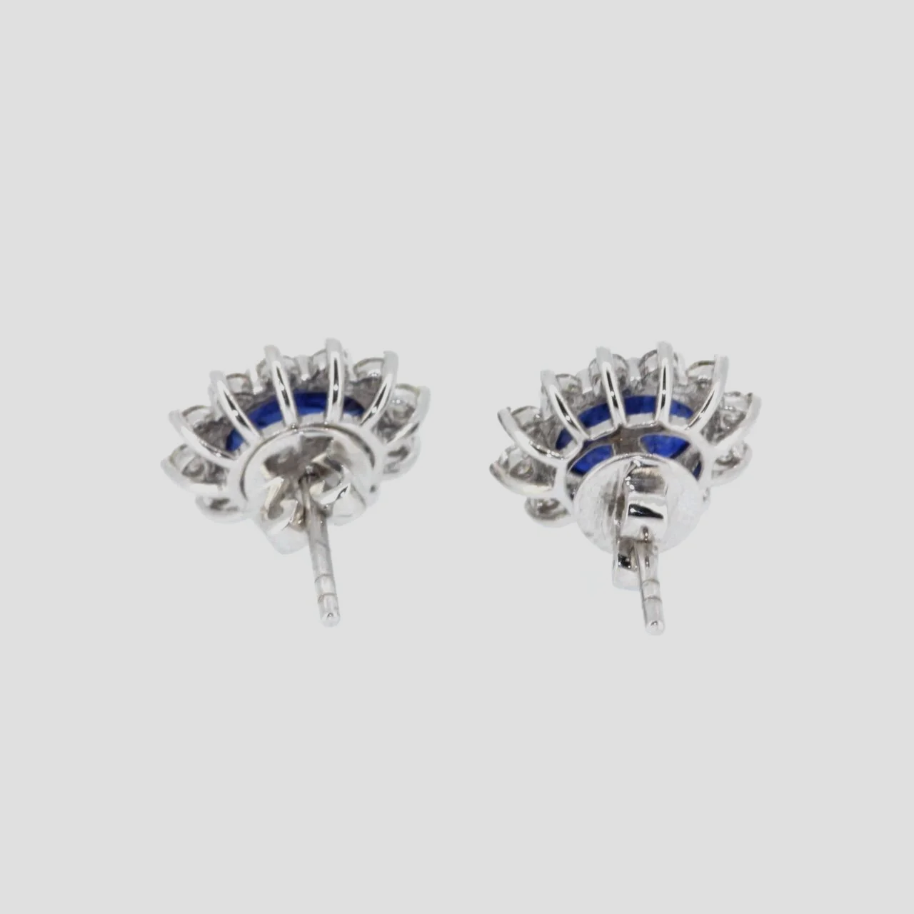 Sapphire-diamond-cluster-earrings-18k-white-gold-jewellery-www.saulgreenstein.co.uk3.png
