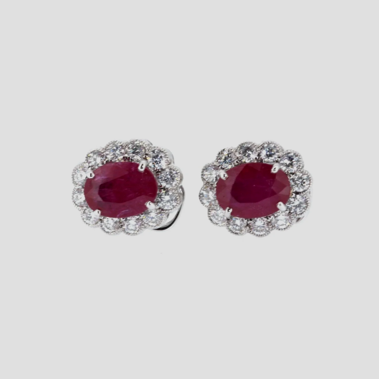 Ruby-diamond-cluster-earrings-18k-white-gold-jewellery-www.saulgreenstein.co.uk1.png