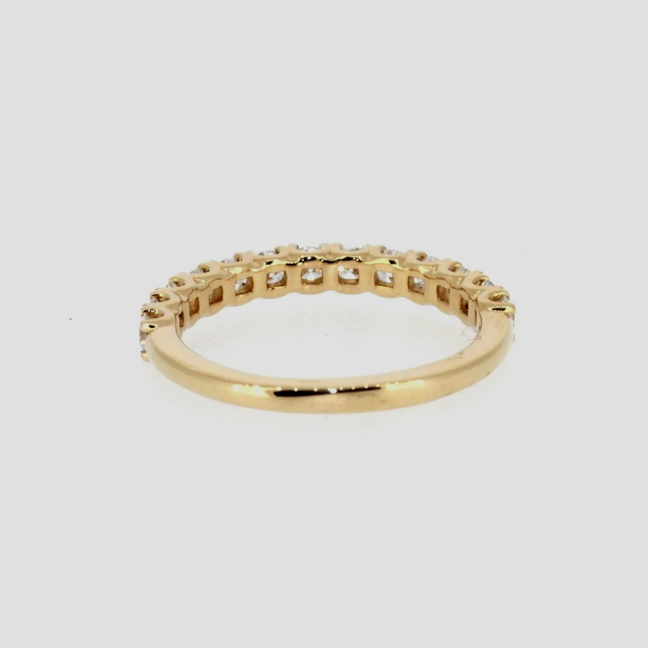0.62ct-diamond-half-eternity-ring-18k-yellow-gold-www.saulgreenstein.co.uk3.png