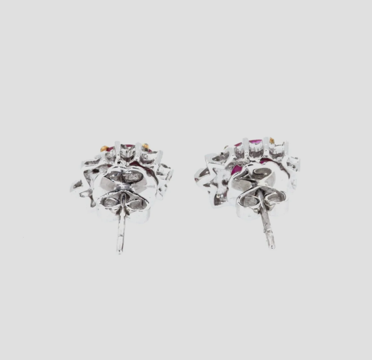Fancy-ruby-diamond-cluster-earrings-18k-white-gold-jewellery-www.saulgreenstein.co.uk3.png