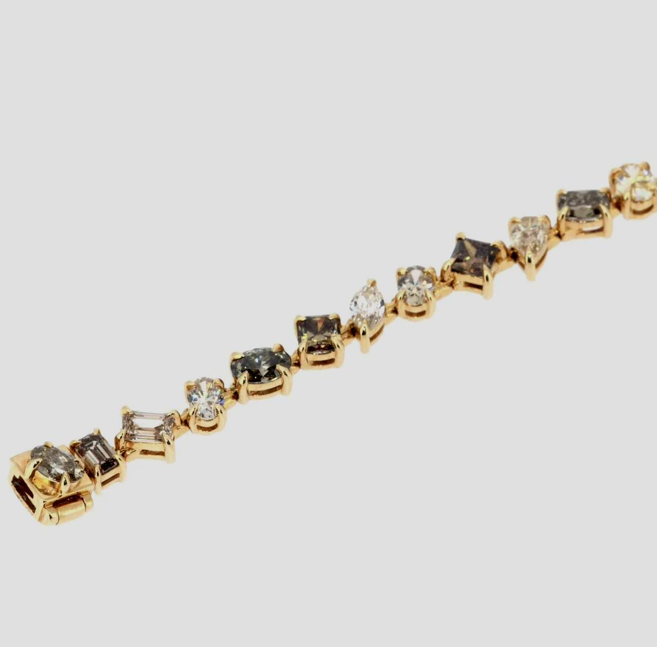 Mixed-shape-cognac-fancy-diamond-bracelet-18k-yellow-gold-jewellery-www.greensteinco.co.uk5.png