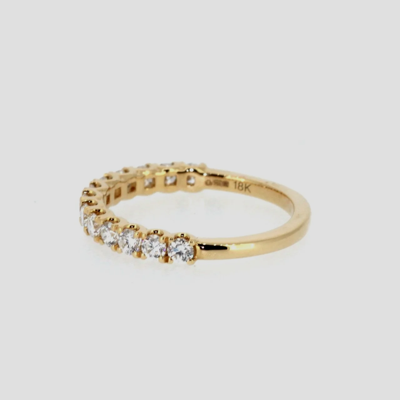0.62ct-diamond-half-eternity-ring-18k-yellow-gold-www.saulgreenstein.co.uk2.png