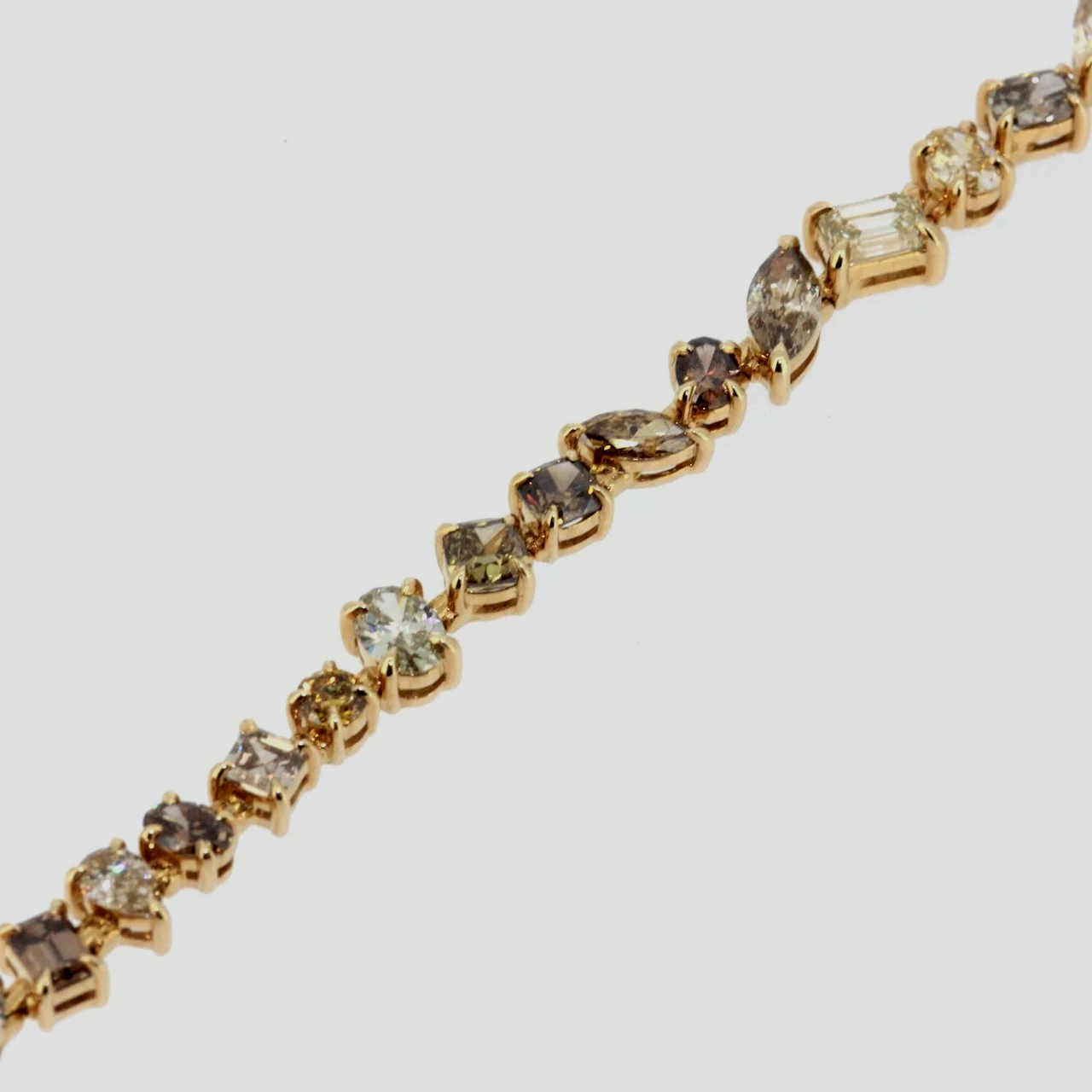 Mixed-shape-cognac-fancy-diamond-bracelet-18k-yellow-gold-jewellery-www.greensteinco.co.uk3.png