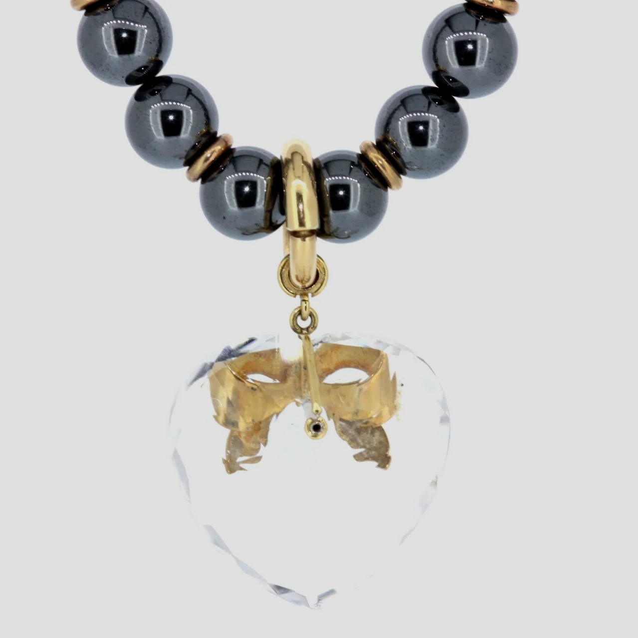 Hematite-rock-crystal-heart-gold-pedant-jewellery-www.saulgreenstein.co.uk2.png