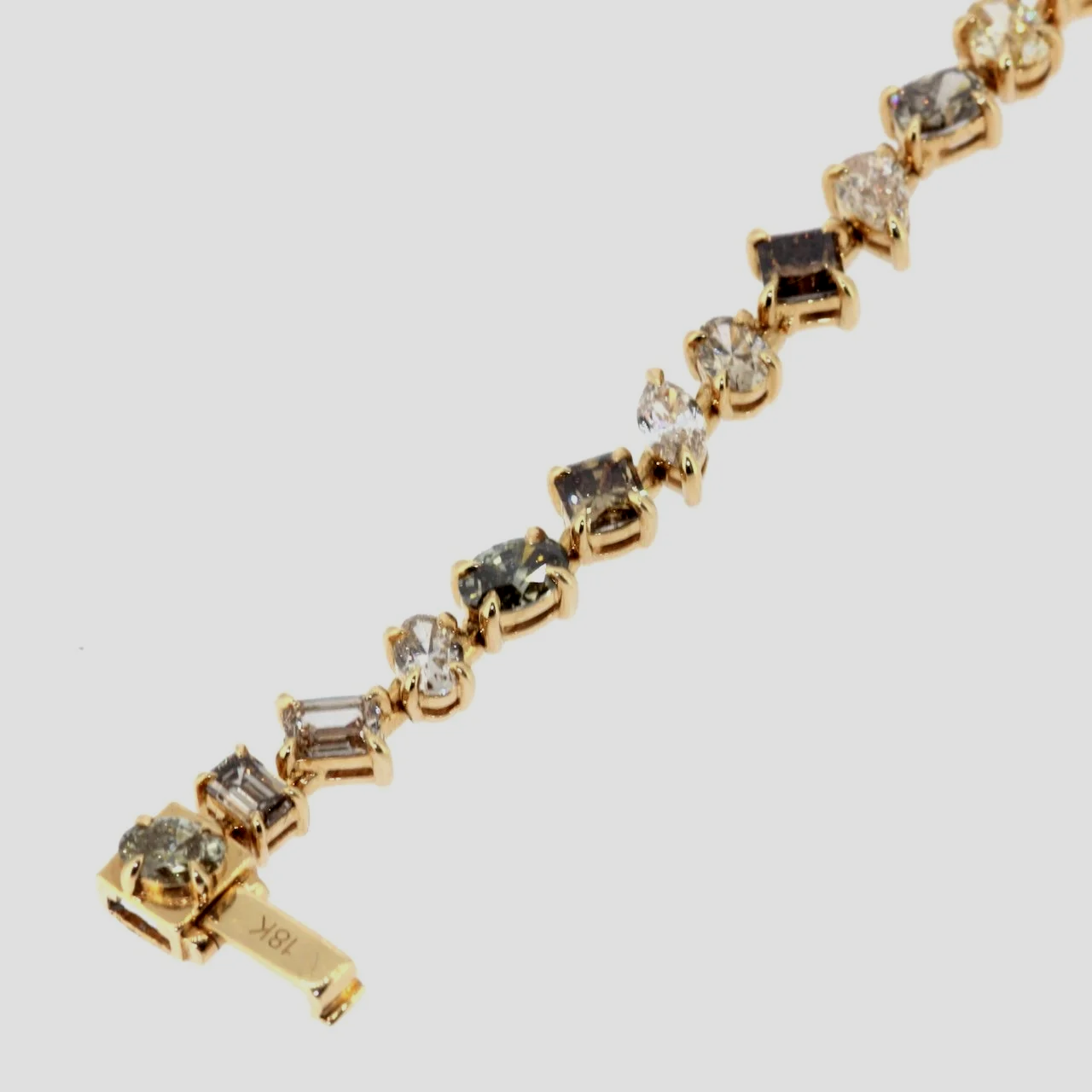 Mixed-shape-cognac-fancy-diamond-bracelet-18k-yellow-gold-jewellery-www.greensteinco.co.uk6.png