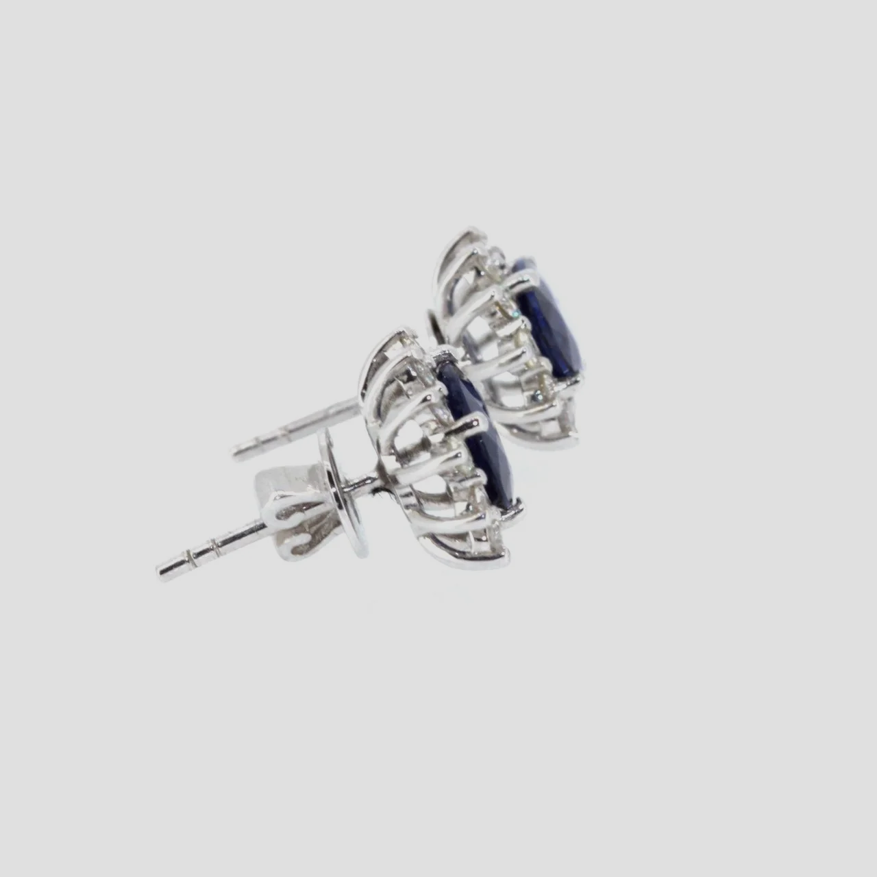 Sapphire-diamond-cluster-earrings-18k-white-gold-jewellery-www.saulgreenstein.co.uk2.png