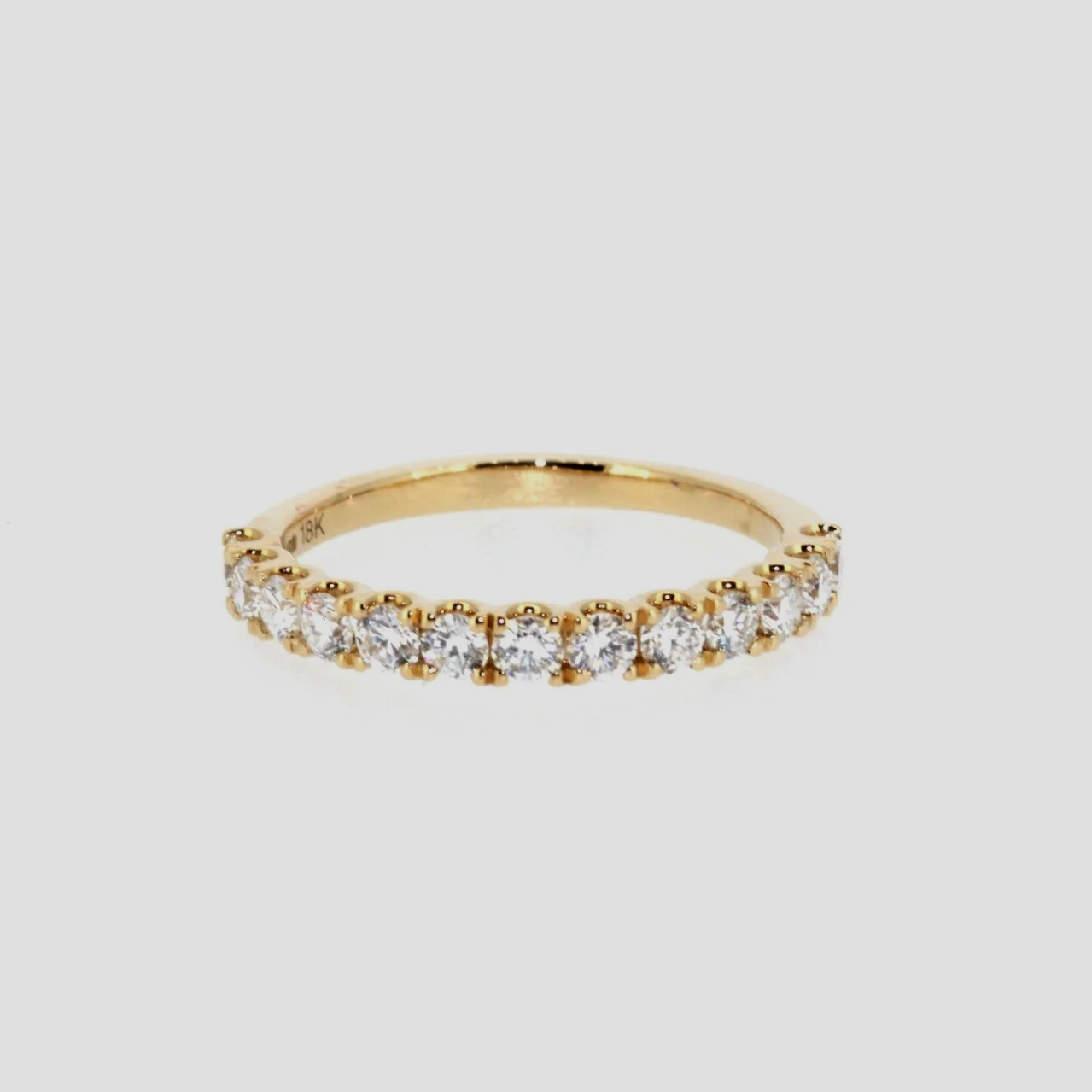 0.62ct-diamond-half-eternity-ring-18k-yellow-gold-www.saulgreenstein.co.uk1.png