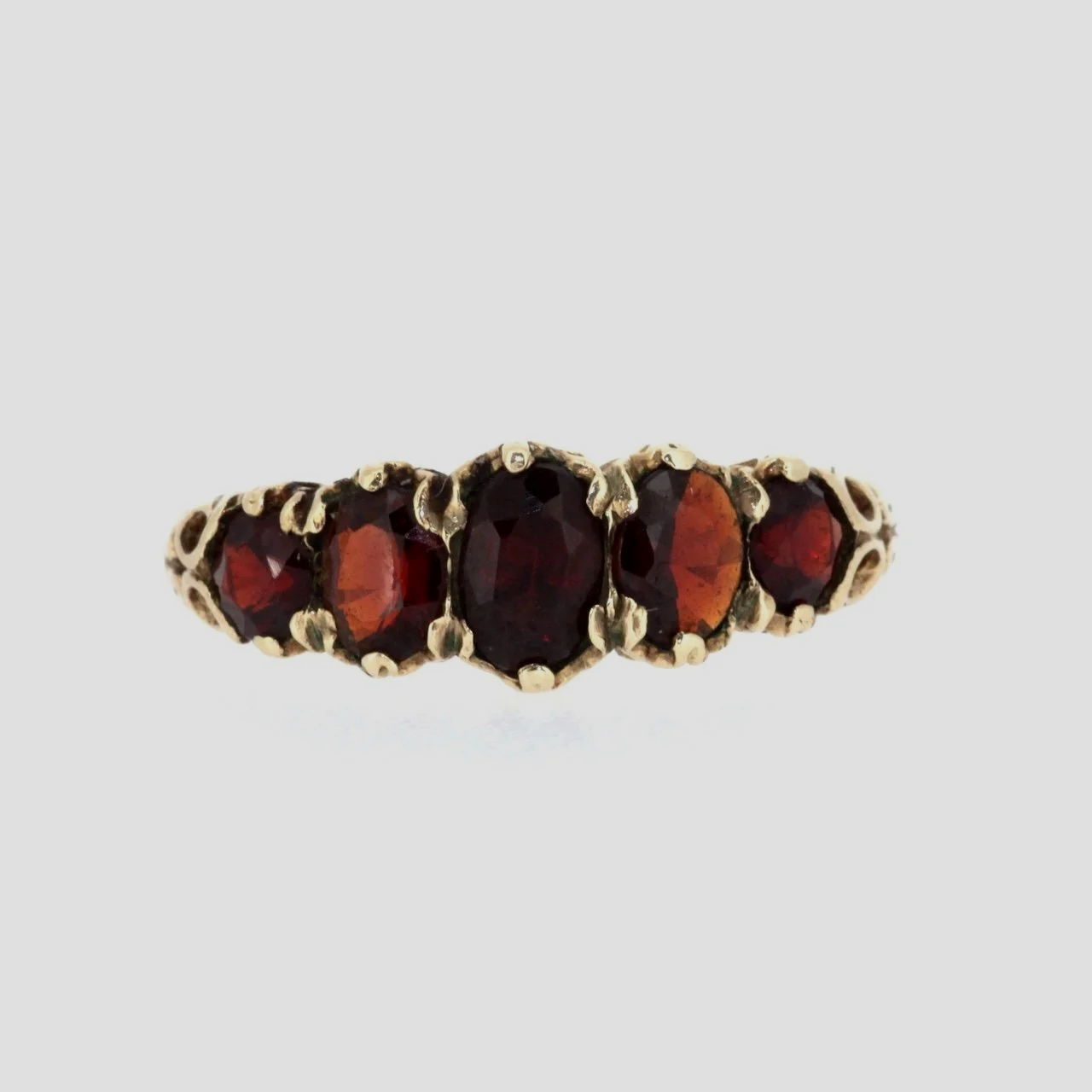 Five-stone-garnet-ring-1920-jewellery-www.saulgreenstein.co.uk1.png