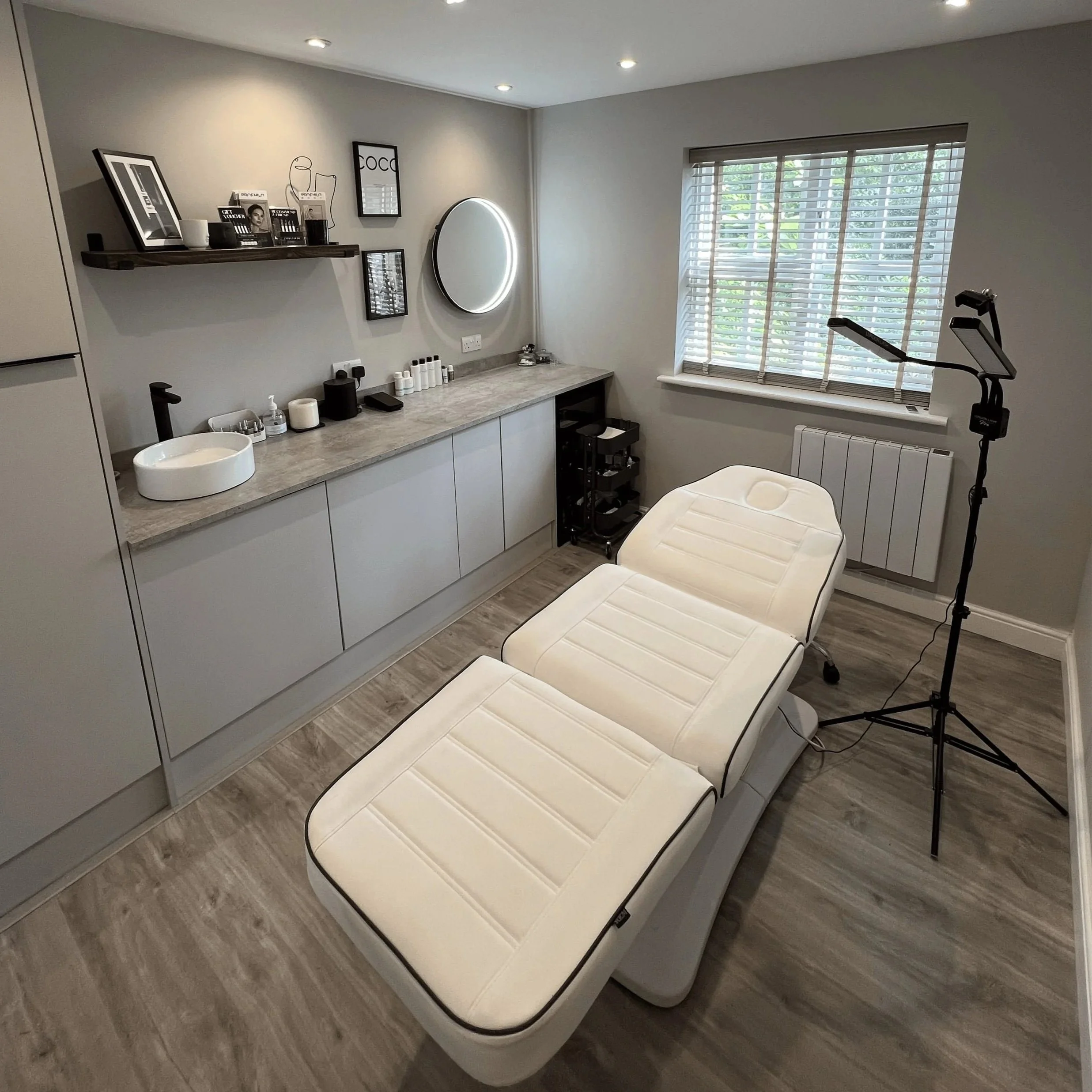 Private treatment room with heated beauty bed at Enhanced by Emma Louise, Surbiton