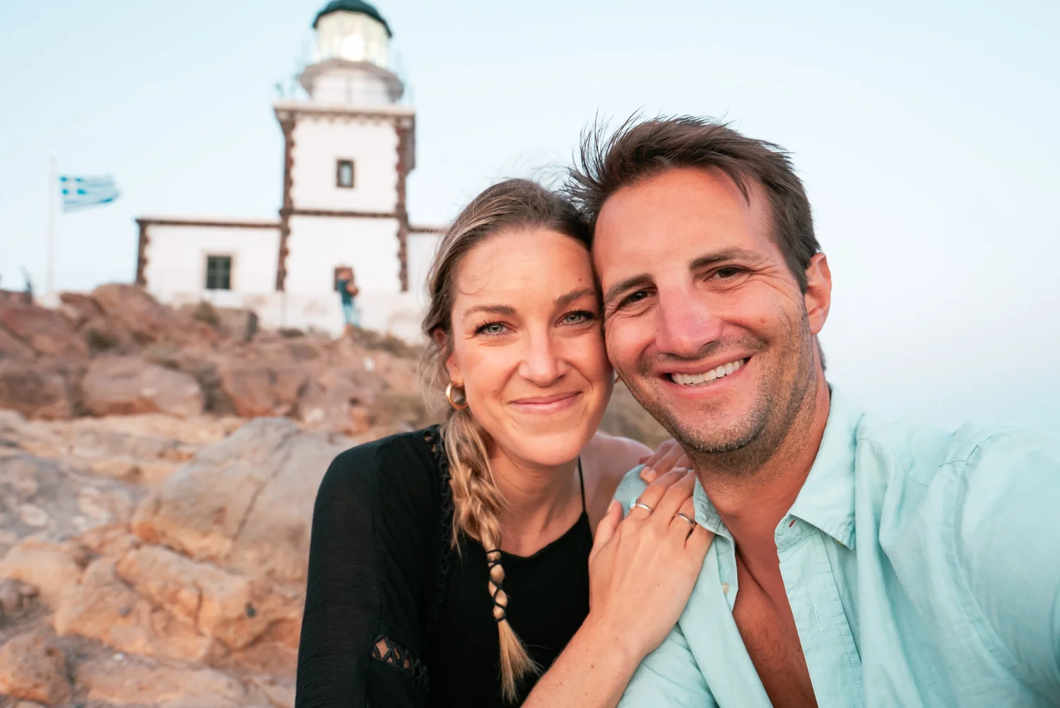 Tim and Fin at a lighthouse in Santorini