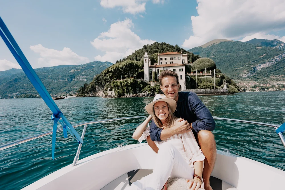 Tim and Fin on a boat on Lake Como