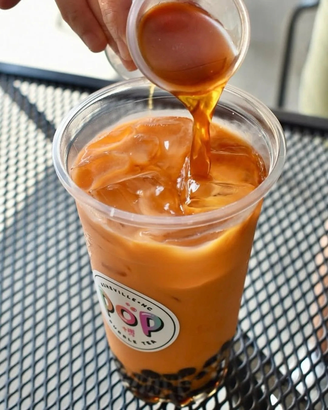 Thai Coffee Milk Tea returns for this week’s #MilkTeaMonday! Order in-store or *Online. Many thanks to @pennycupco for providing the high-quality beans we use to make this drink (and all our drinks with cold brew)!
 Thai Coffee Milk Tea contai