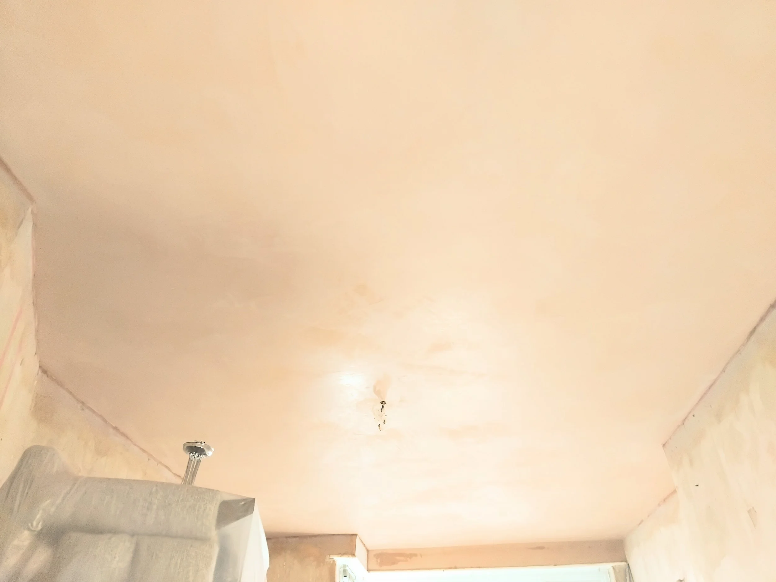 Ceiling overboarded and skimmed in Droylesden 