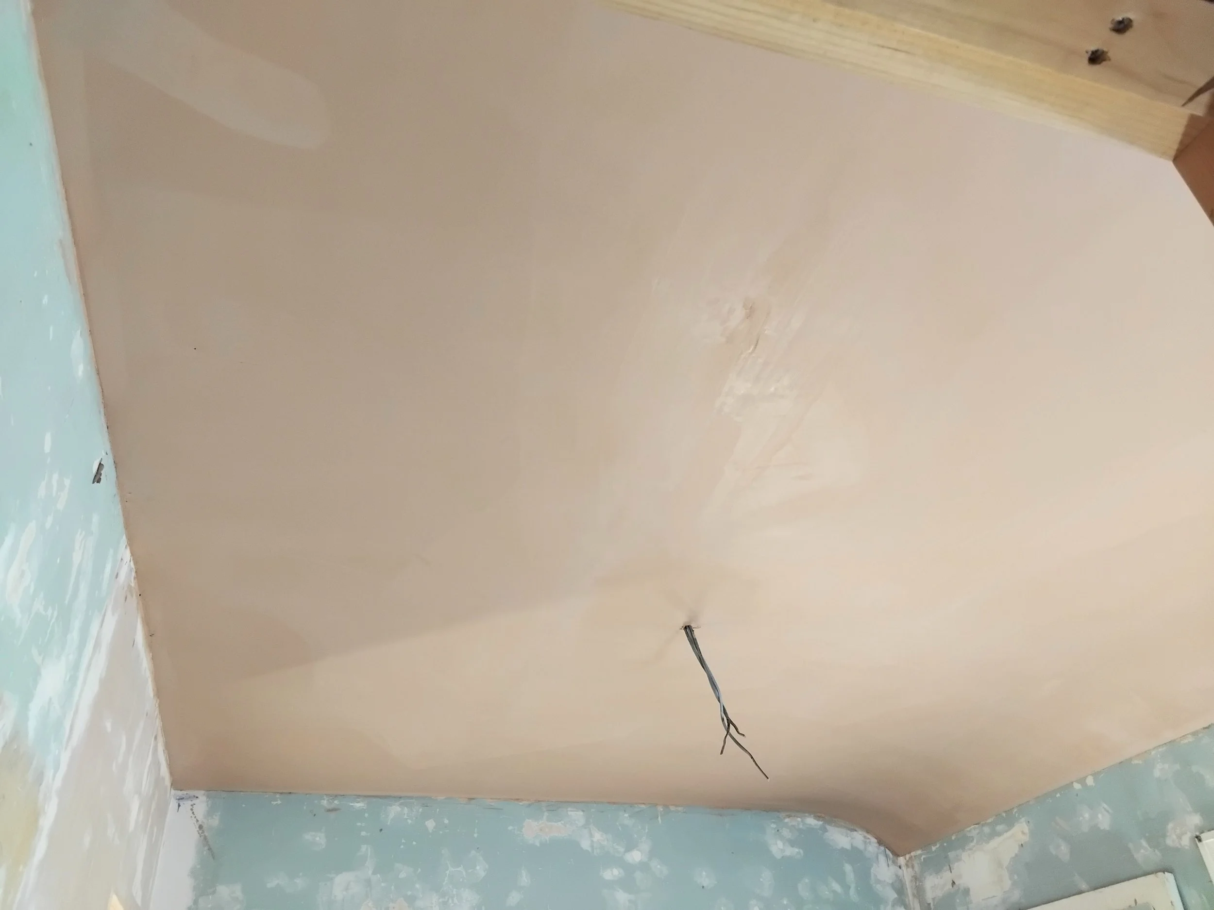 Curved bedroom ceiling plastered in New Mills
