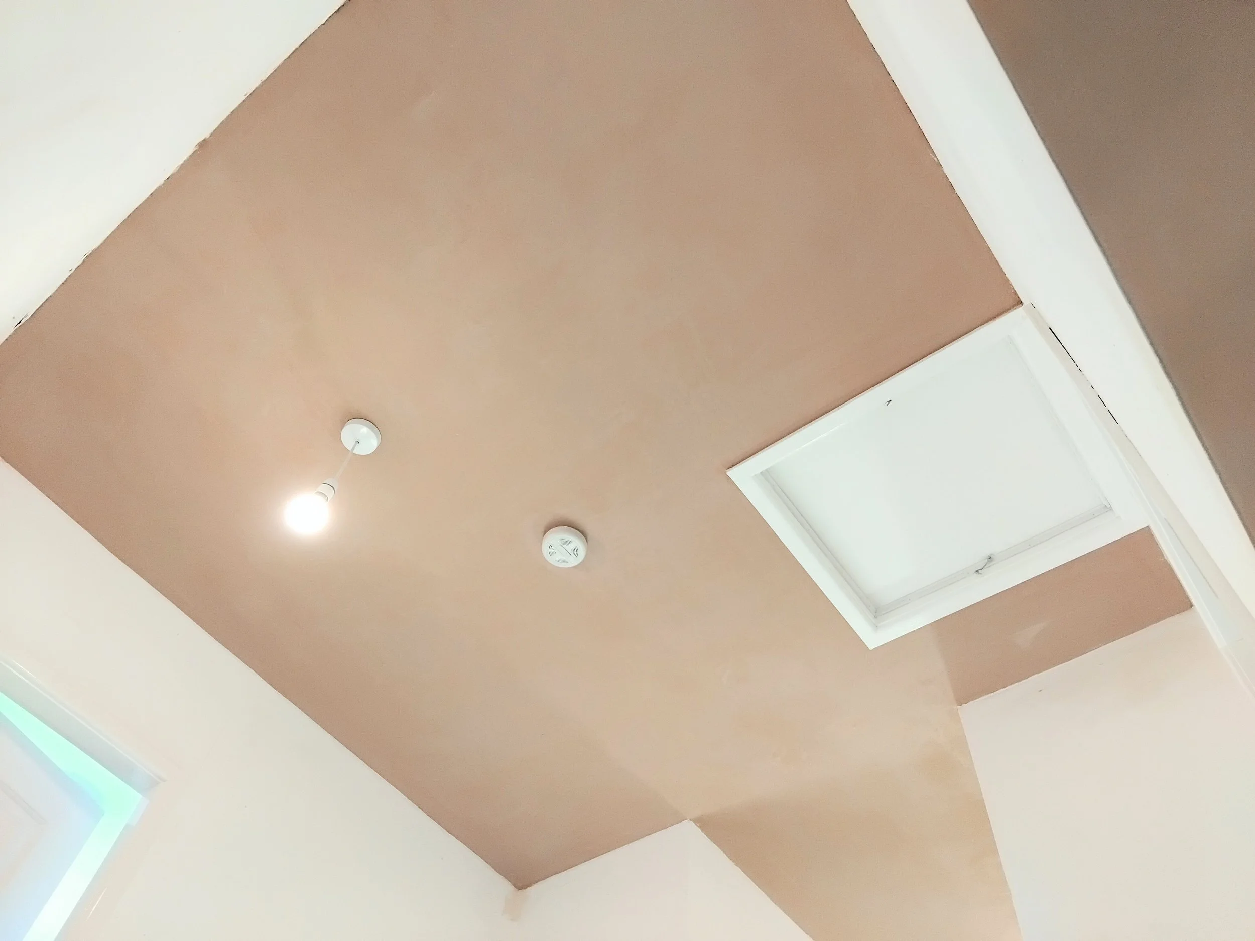 Landing ceiling skimmed in Glossop