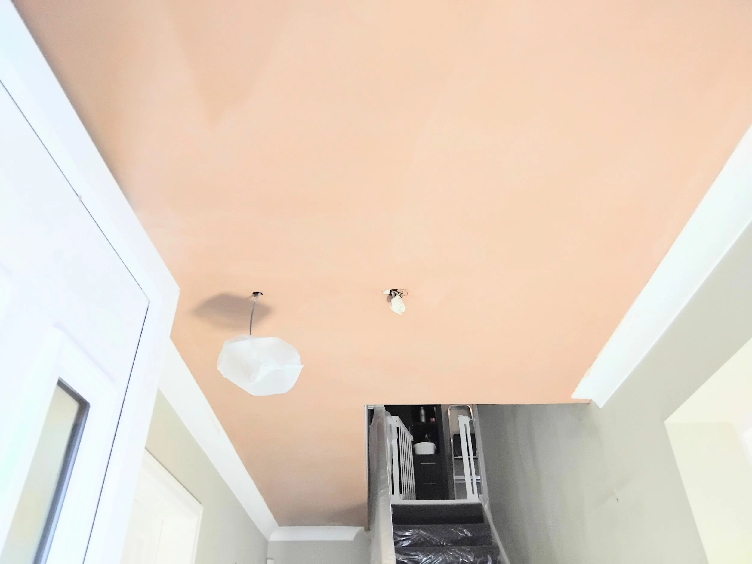 Hallway ceiling plasterboarded and skimmed in Glossop