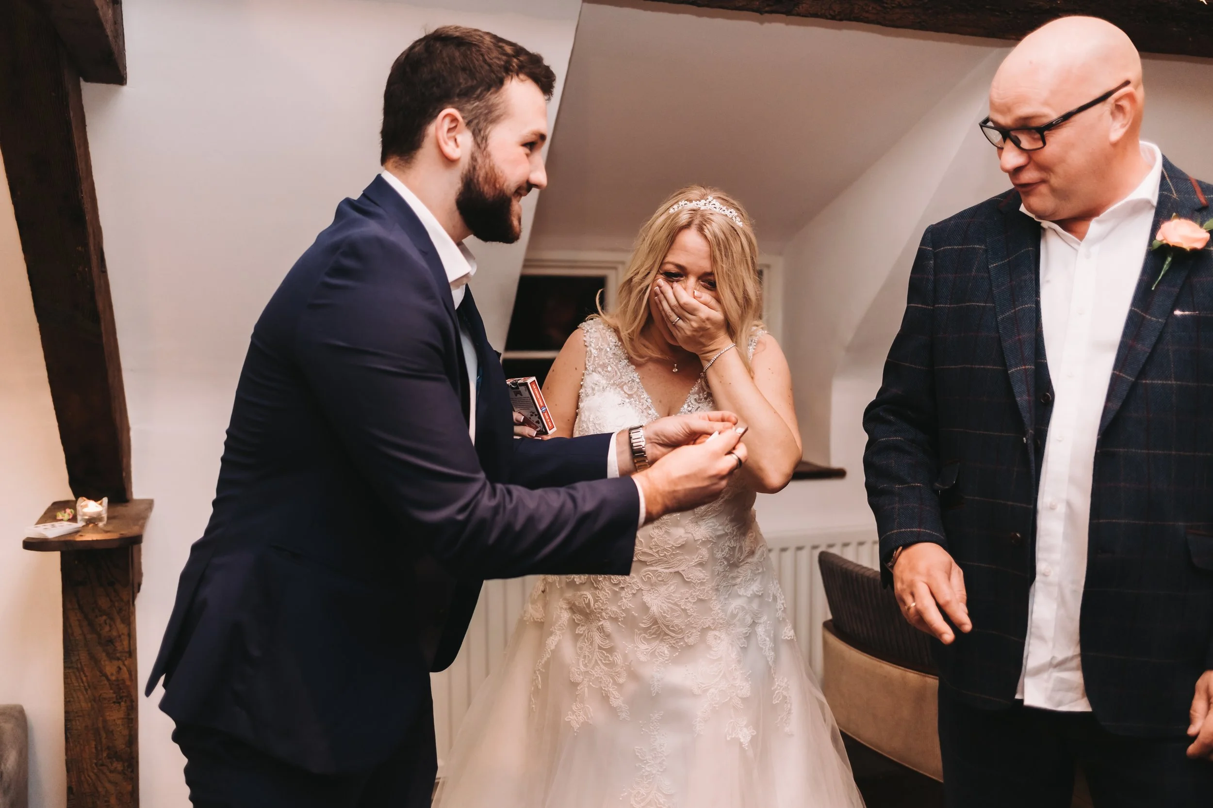 magician is performing magic at an event