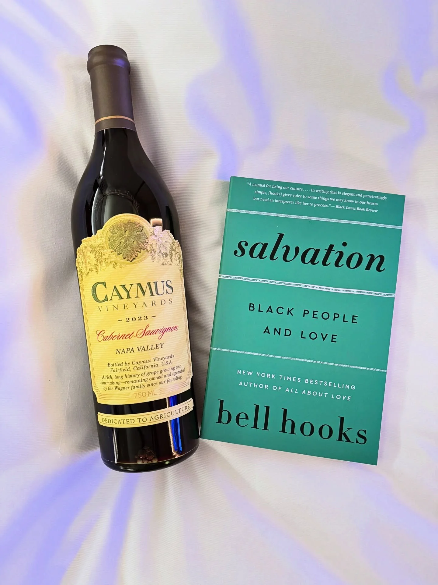 First book + wine pairing of 2026. 🍷📖

I started the year with Salvation: Black People and Love by bell hooks paired with one of my forever faves. It feels grounding to begin the year with a book that asks us to slow down and lead with love. I&rsqu