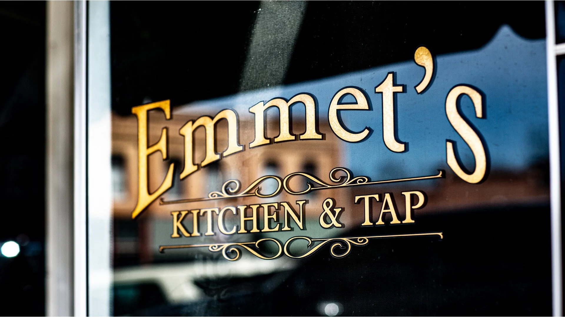 Emmet's Kitchen & Tap Logo on Door