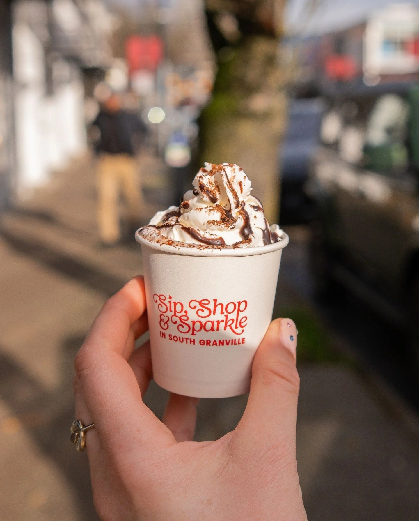Only one more week until this is your POV. ✨⁠
⁠
A hot cocoa in hand, (hopefully) winter sun on your face, and South Granville buzzing with festive energy. 🎄⁠
⁠
Sip, Shop &amp; Sparkle lands next Saturday - bringing creative hot chocolate tastings fr