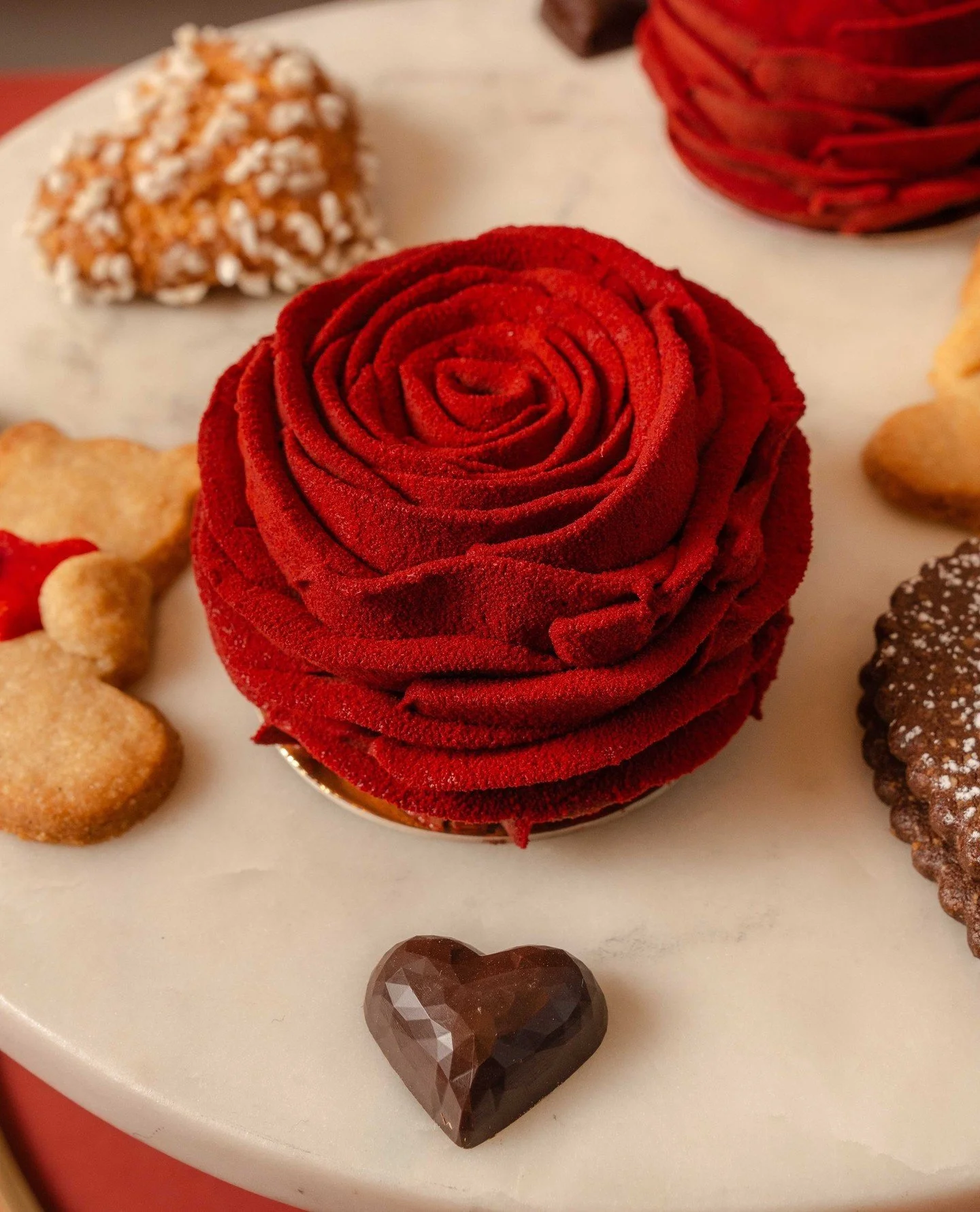 PSA: This is not a flower. 🌹⁠
⁠
It&rsquo;s an edible work of art&mdash;the Chocolate Raspberry Rose is crafted with a rich chocolate brownie, raspberry compote, and silky Valrhona chocolate cr&egrave;meaux.⁠
⁠
@sv_bakery has also prepared a full col