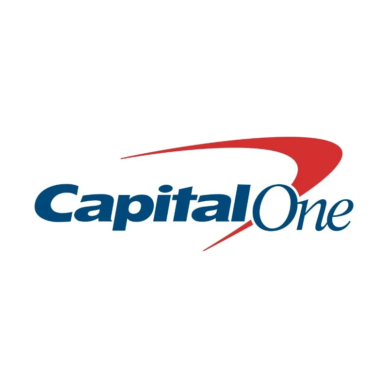 Capital One logo with blue text and a red swoosh above it.