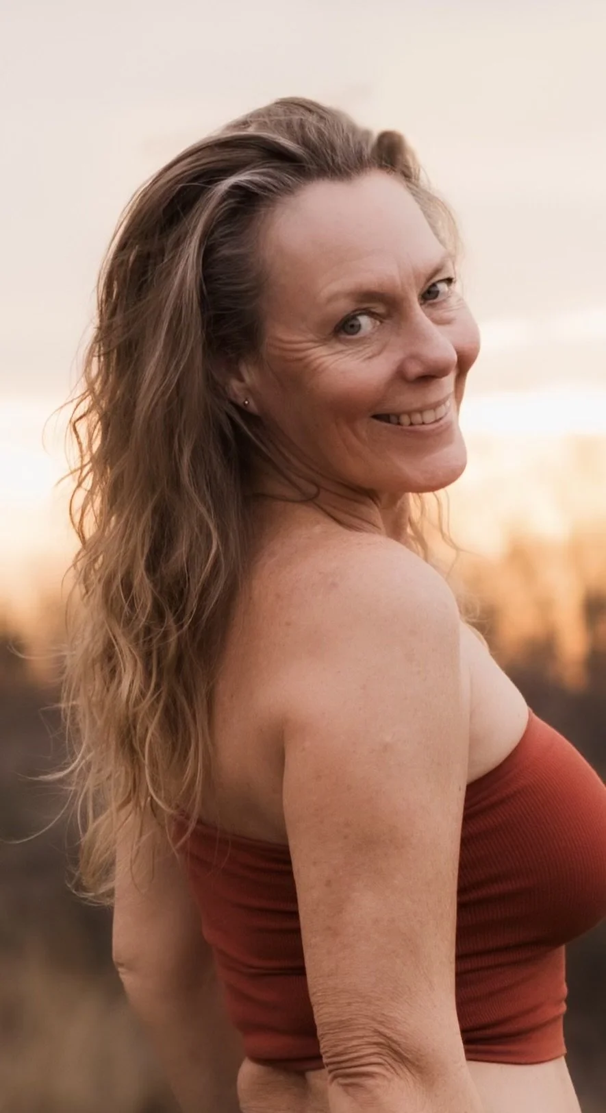 Mrs. Evie Mae in a sunset