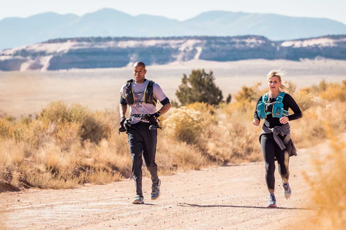  David Goggins and pacer running through the desert during Moab 240 