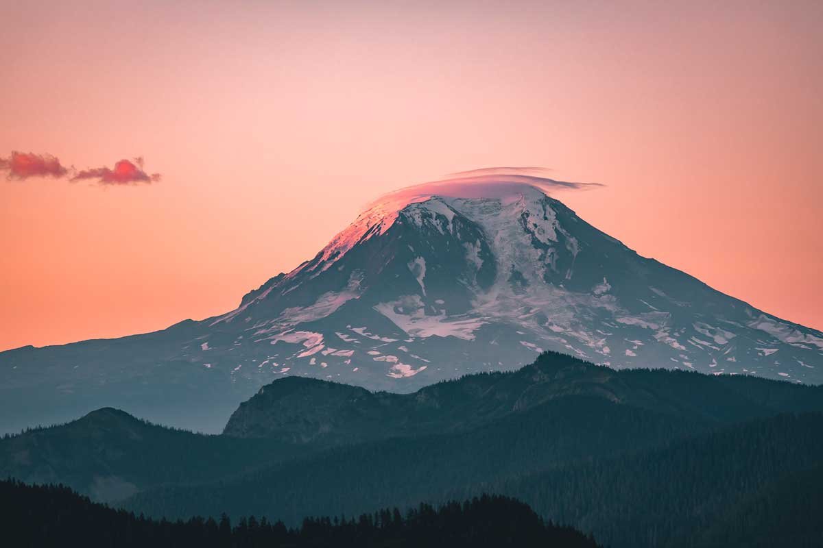  Sunrise over Mount Adams, with pink whispy clouds on top of the peak 