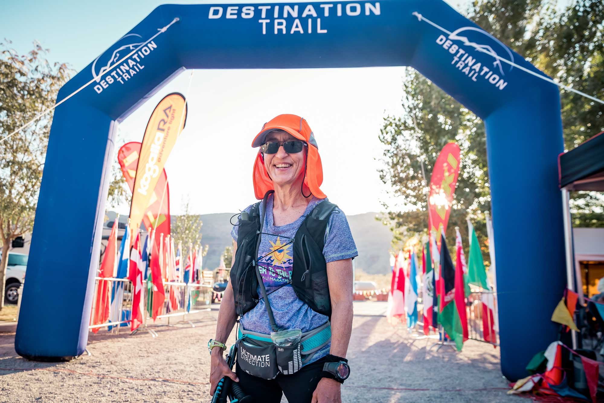  A female runner at the finish line of Moab 240 