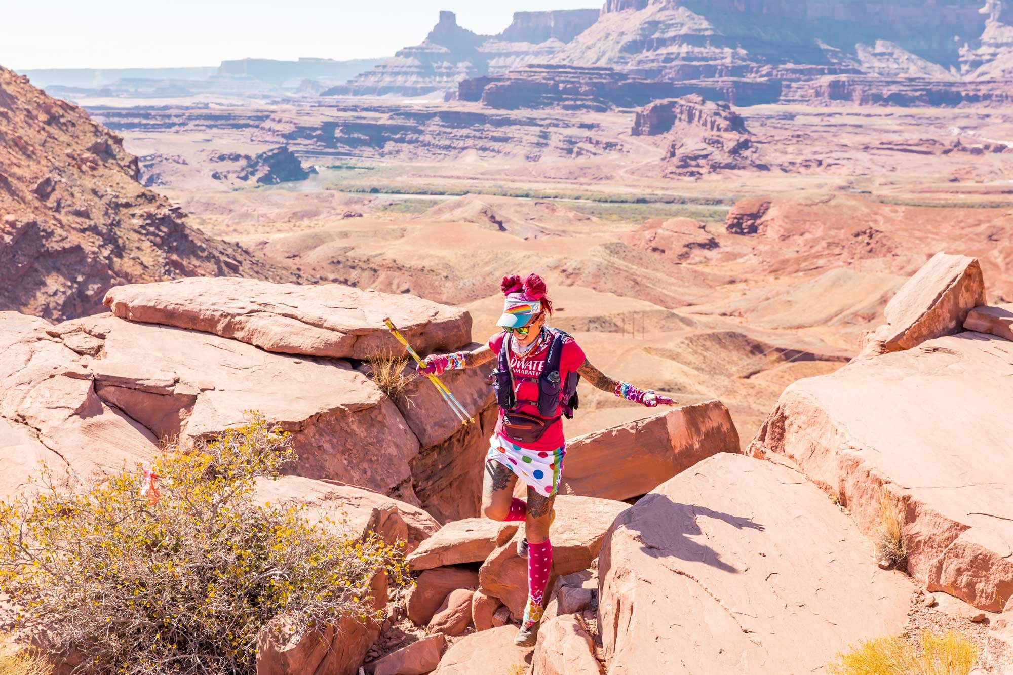  A colorfully dressed female runner at Jackson’s Ladder at Moab 240 