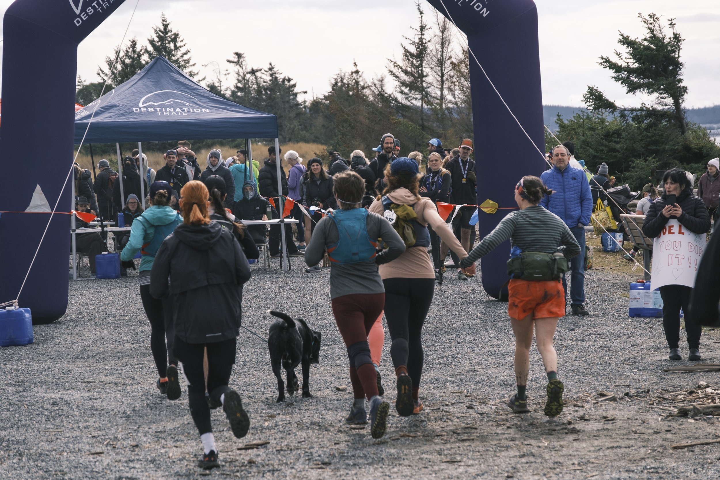 Runners crossing the finish line together