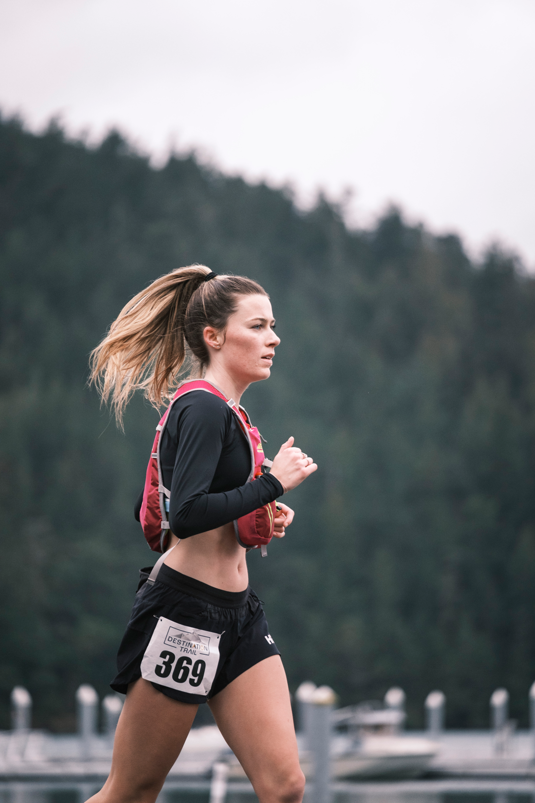  A female runner racing at Deception Pass 