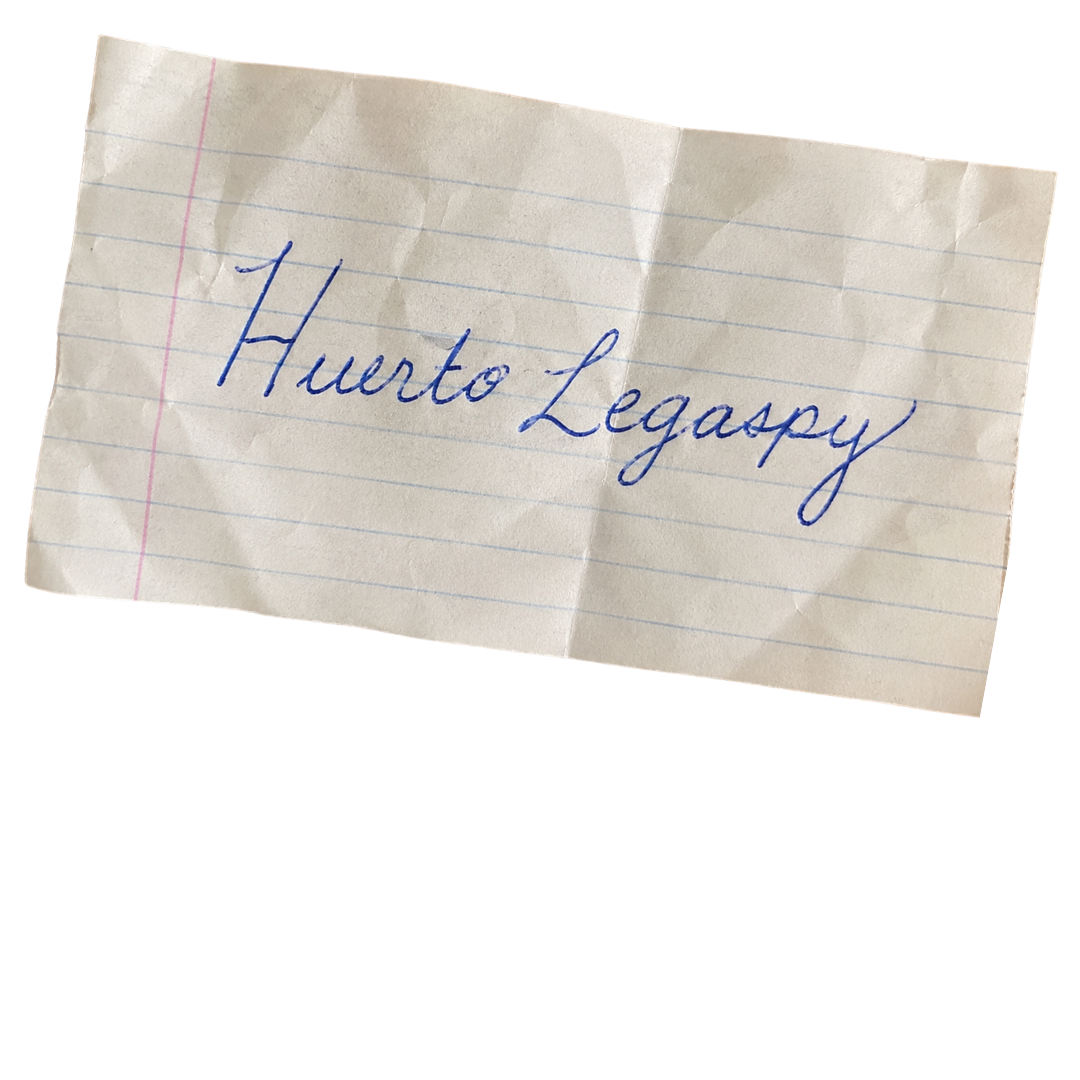 Notas escritas a mano con la frase "Huerto Legacy".
