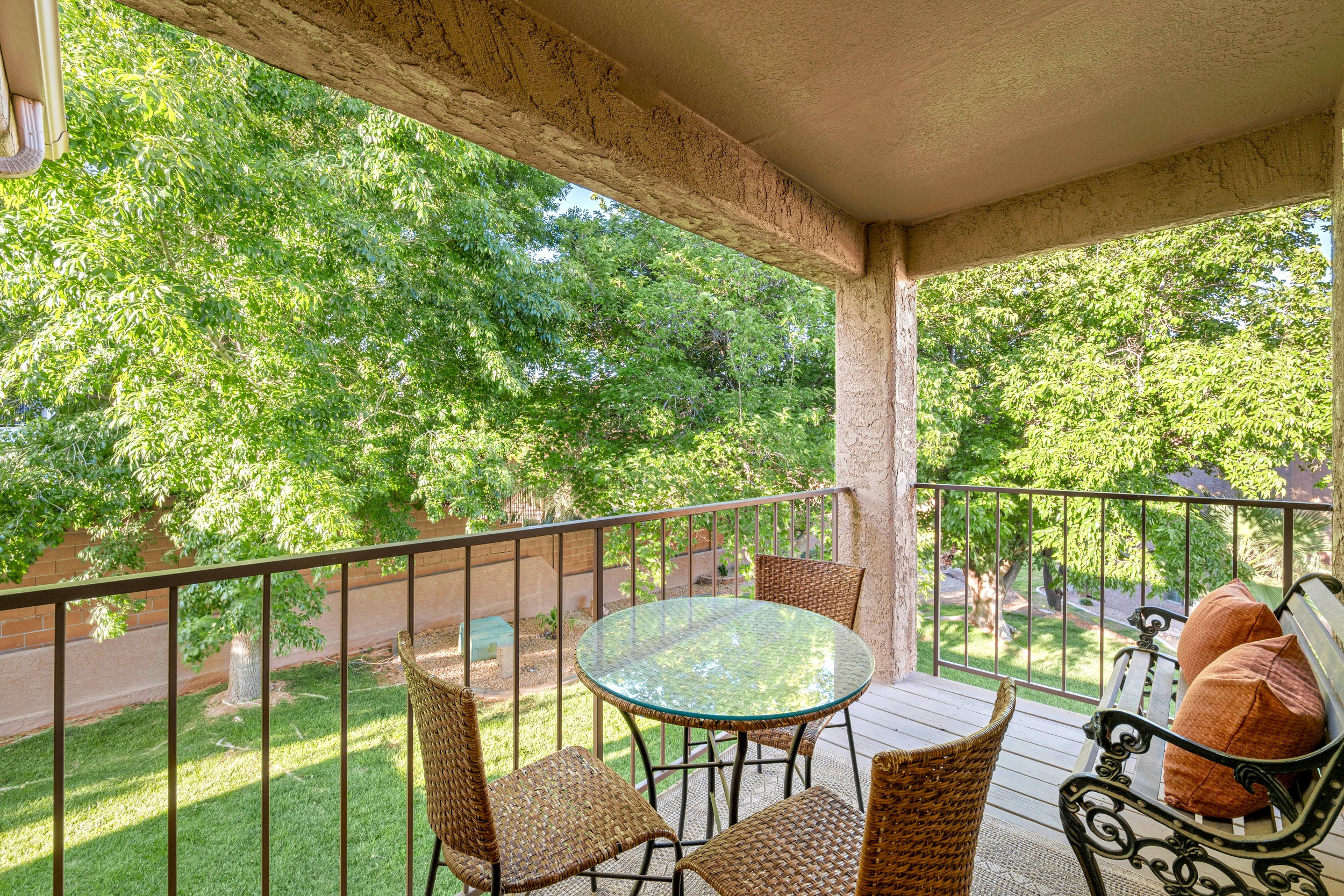The peaceful balcony is perfect for coffee or a meal