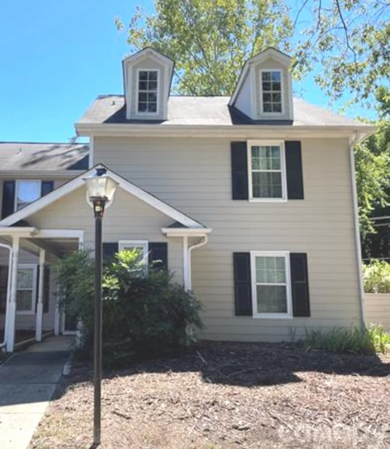 quaint townhome with sidewalk lightpost