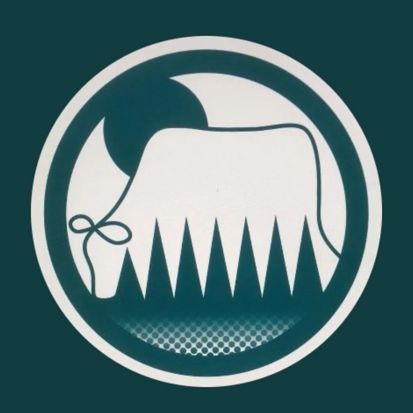 A stylized graphic of Santa Claus' hat, beard, and a Christmas tree inside a circular border.