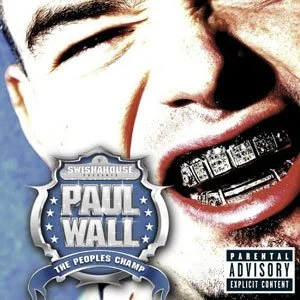 Close-up of a smiling man with a grill featuring the words 'Swishahouse Paul Wall The People's Champ' and an explicit content warning.